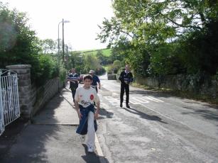 Nicholas (nearest camera) Steph, Steve H and D walking through Llanilltid Fawr
