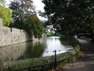 Looking South-East along the moat from the North-West corner